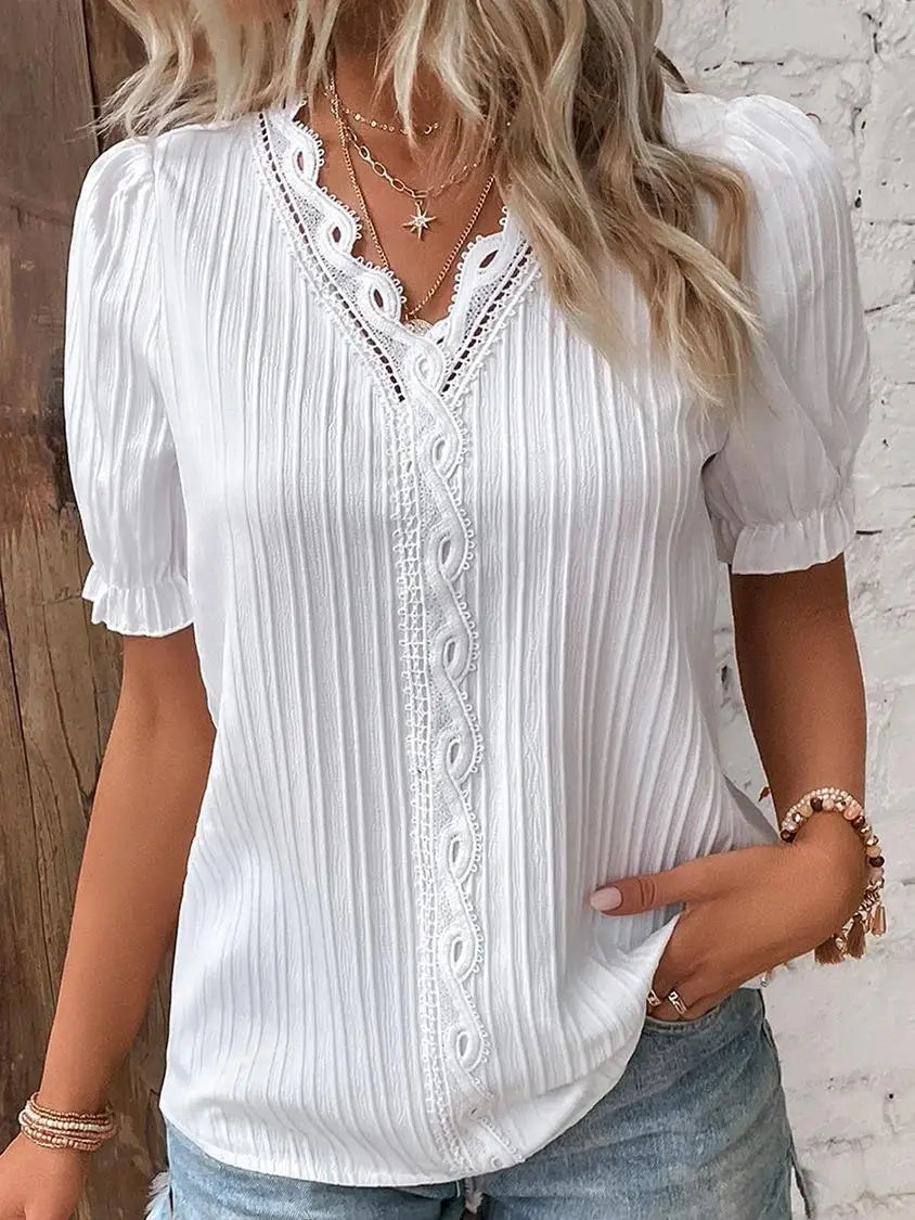 Holm™ | Mira – Feminin top med spidsdetaljer